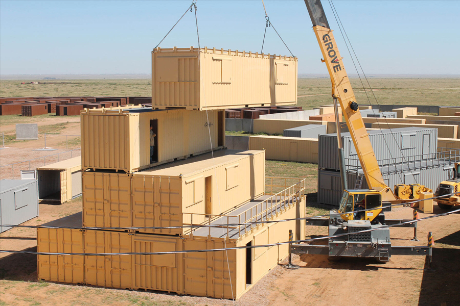 Quali sono i vantaggi significativi delle case del modulo container rispetto agli edifici tradizionali.